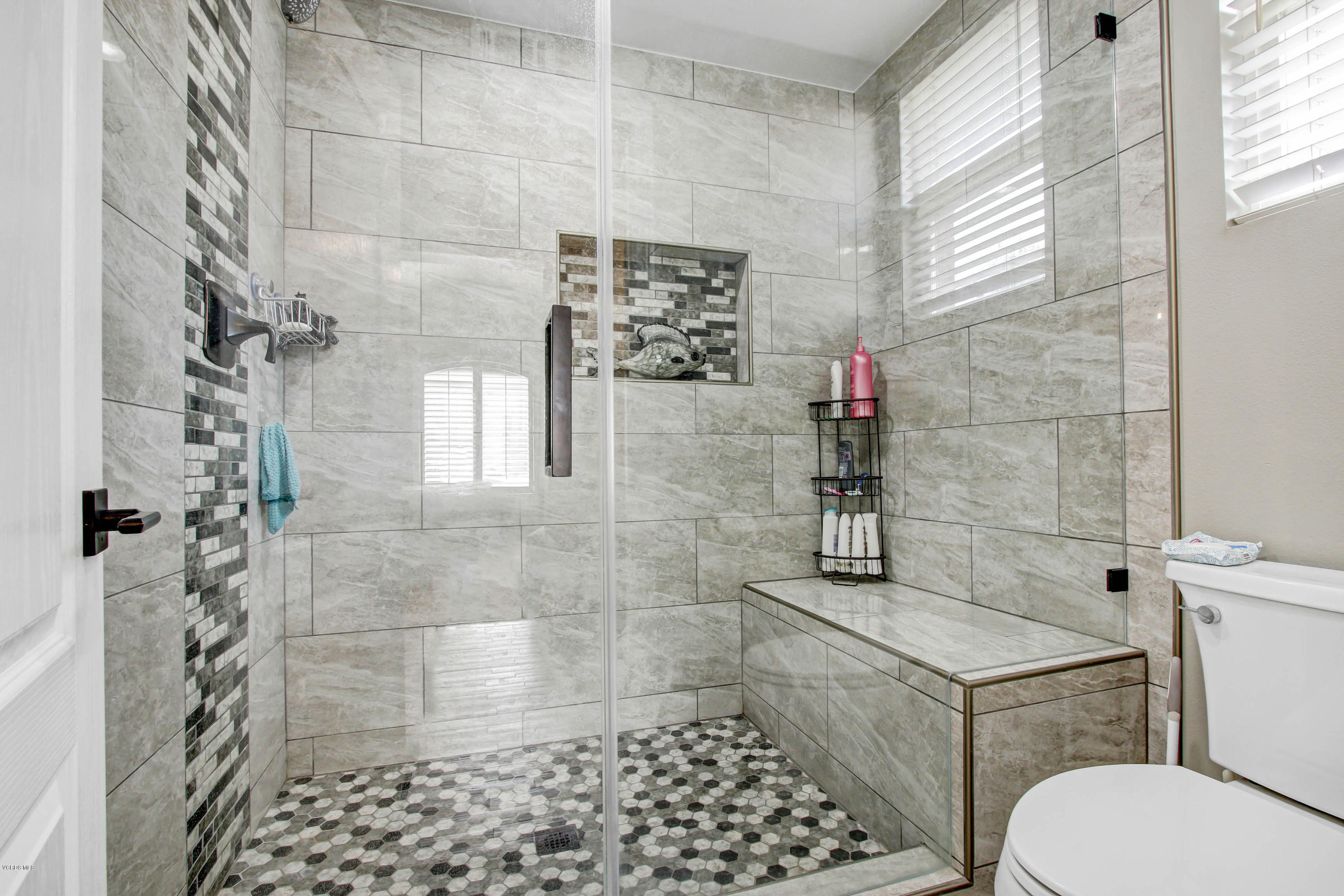 697 Lariate Lane, Unit A Simi Valley, CA 93065 - Photo 15 of 26 a bathroom with a toilet and a shower