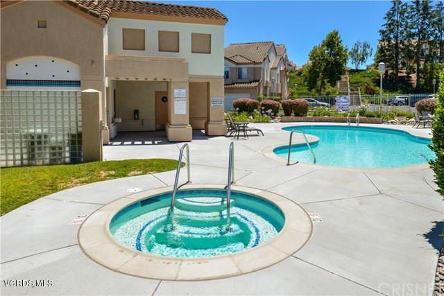 697 Lariate Lane, Unit A Simi Valley, CA 93065 - Photo 25 of 26 a view of a swimming pool with a patio