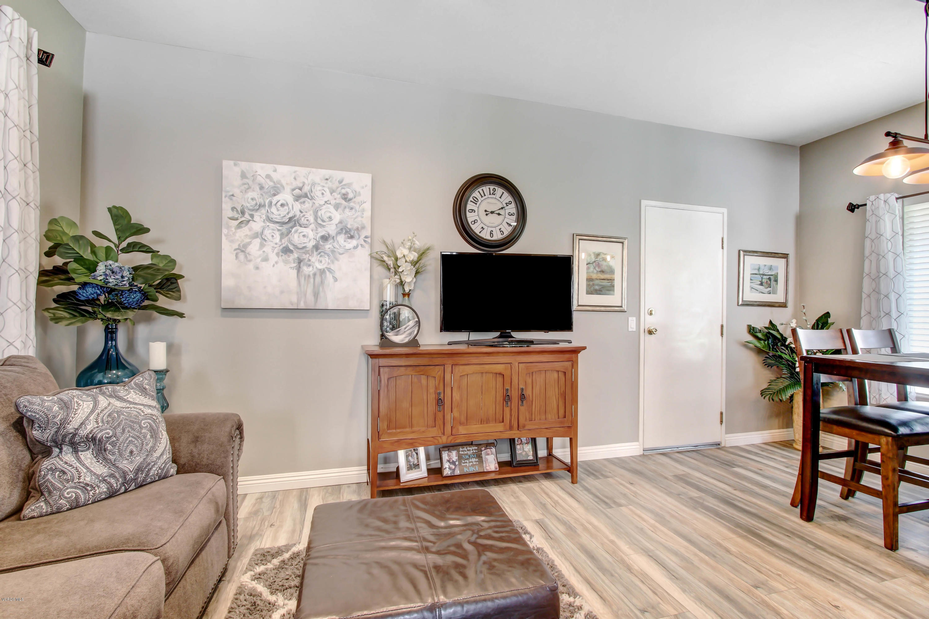 697 Lariate Lane, Unit A Simi Valley, CA 93065 - Photo 5 of 26 a living room with furniture and a flat screen tv