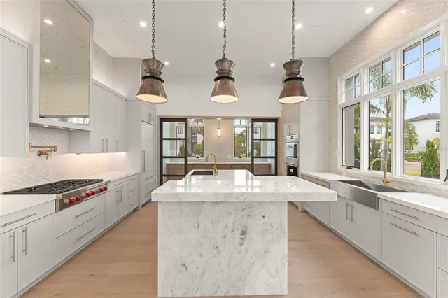 a bathroom with a sink a toilet and vanity