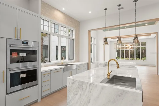 a view of a bathroom with a tub and shower