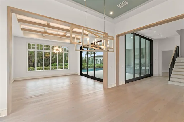 a large kitchen with stainless steel appliances kitchen island a large island in the center