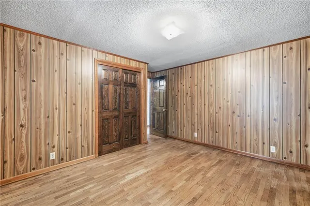 a view of a livingroom with wooden floor