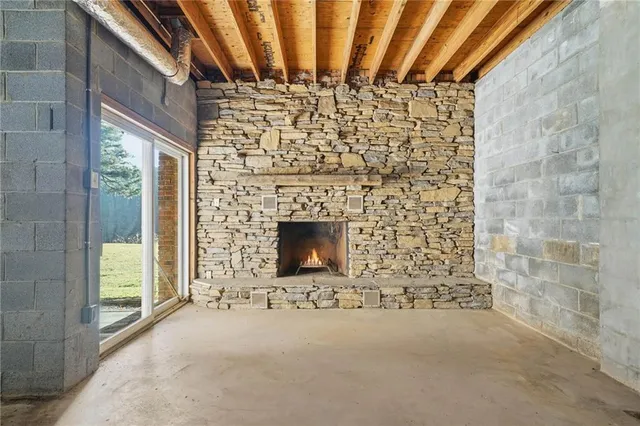 a view of entryway with brick walls