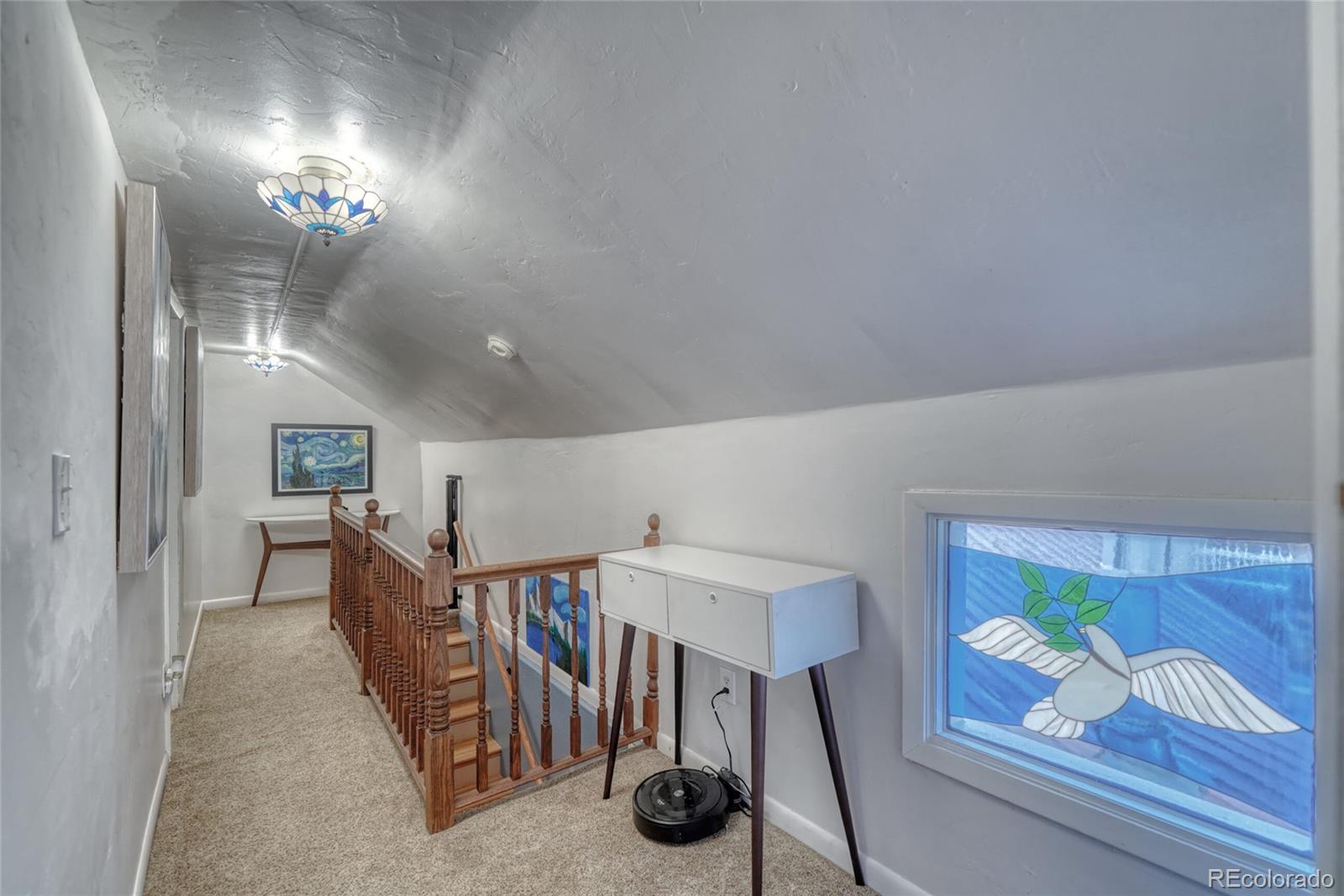 306 Elm Street Leadville, CO 80461 - Photo 18 of 42 a view of a hallway with workspace and livingroom view