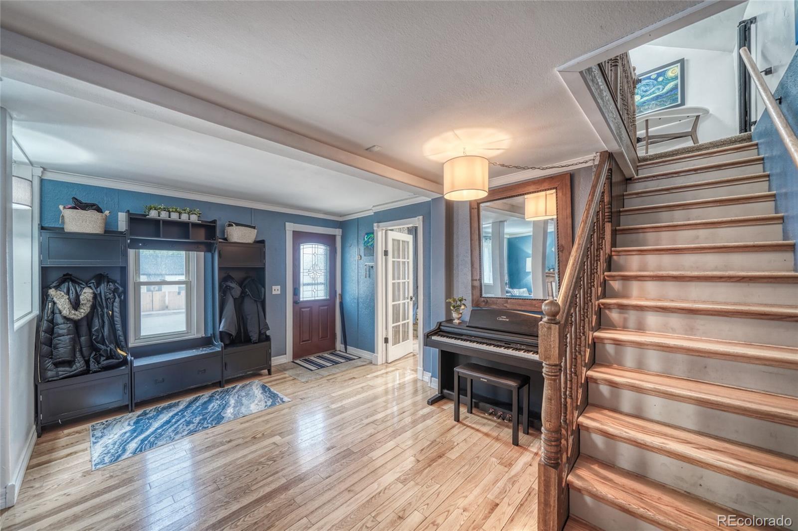306 Elm Street Leadville, CO 80461 - Photo 2 of 42 a view of entryway and hall with wooden floor