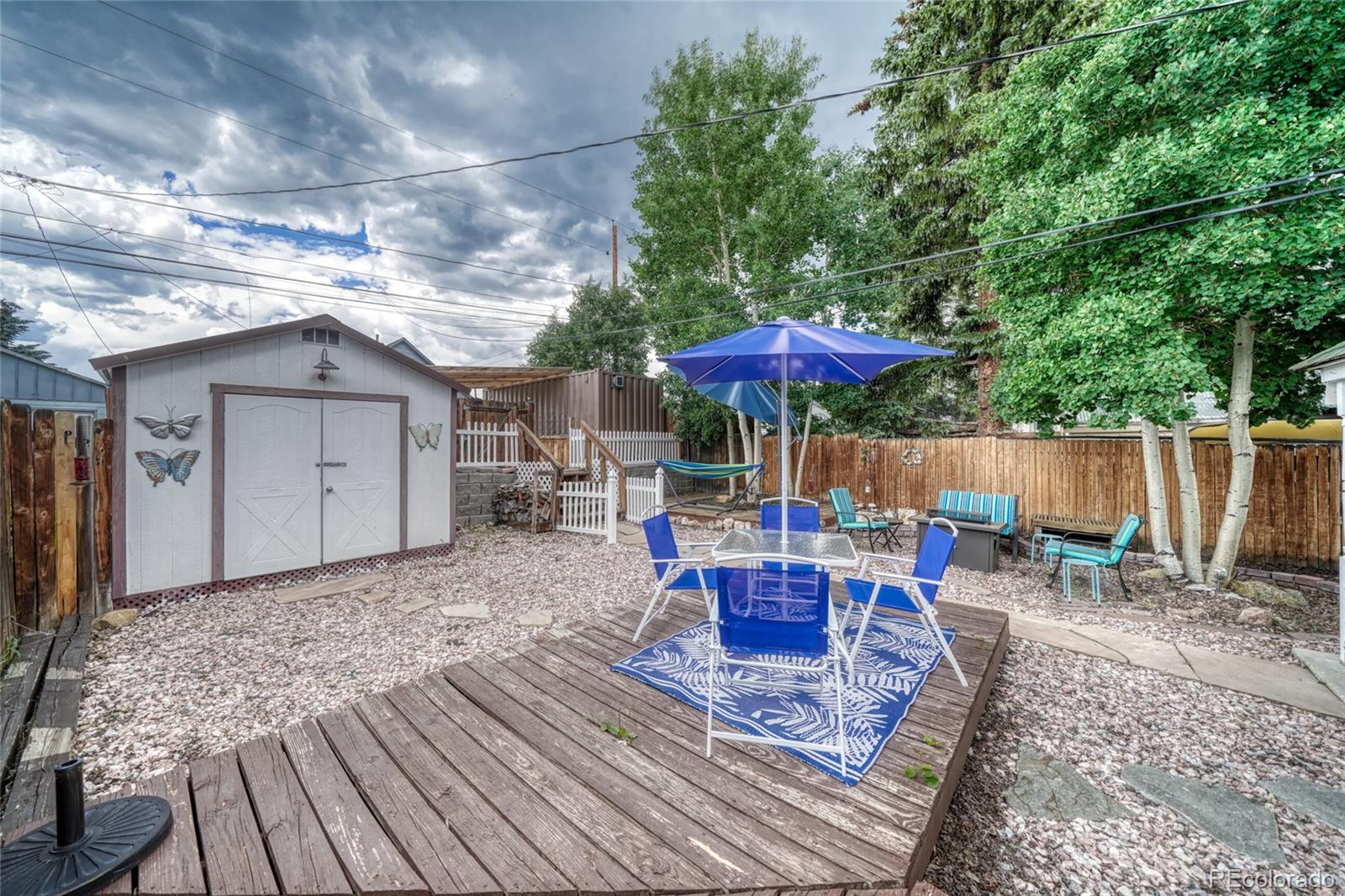 306 Elm Street Leadville, CO 80461 - Photo 26 of 42 a view of a house with backyard and sitting area