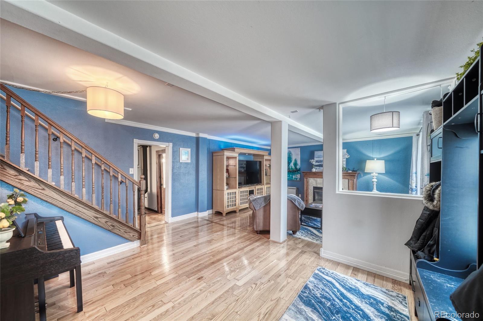 306 Elm Street Leadville, CO 80461 - Photo 7 of 42 a view of a living room with wooden floor and furniture