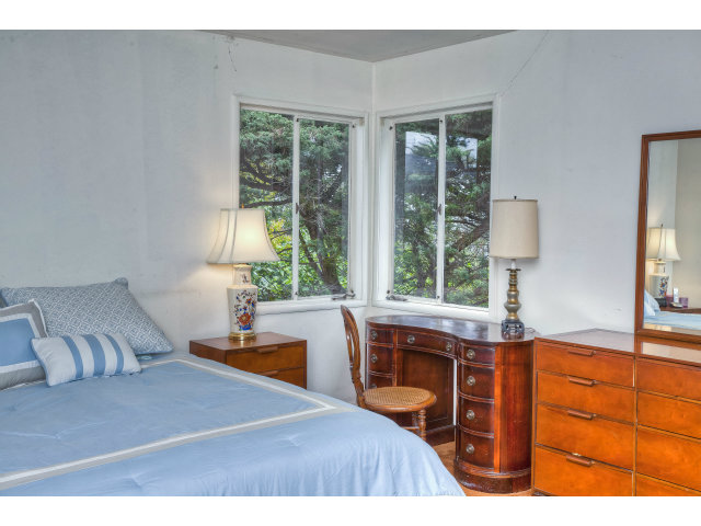 1859 Randall Road San Mateo, CA 94402 - Photo 13 of 22 a bedroom with a bed and a table
