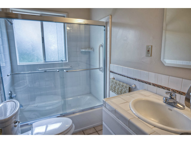 1859 Randall Road San Mateo, CA 94402 - Photo 14 of 22 a bathroom with a sink and a mirror