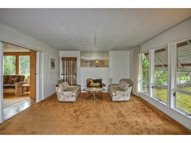 1859 Randall Road San Mateo, CA 94402 - Photo 2 of 22 a living room with furniture and floor to ceiling windows