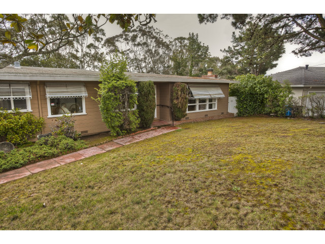 1859 Randall Road San Mateo, CA 94402 - Photo 21 of 22 a view of a house with a yard and potted plants