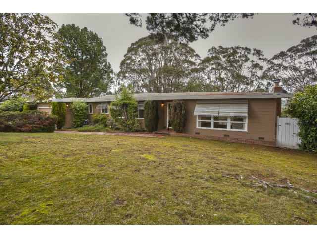 1859 Randall Road San Mateo, CA 94402 - Photo 22 of 22 a front view of a house with a yard