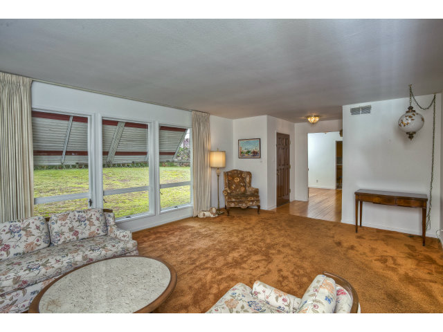 1859 Randall Road San Mateo, CA 94402 - Photo 4 of 22 a bedroom with furniture and large window