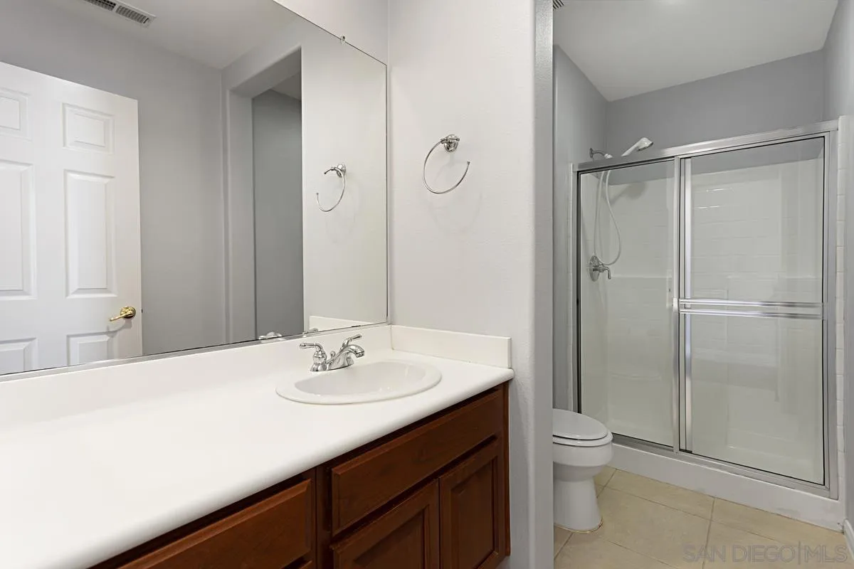 536 Echo Lane San Marcos, CA 92078 - Photo 12 of 24 a bathroom with a sink toilet and shower