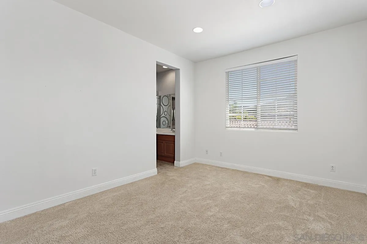 536 Echo Lane San Marcos, CA 92078 - Photo 21 of 24 an empty room with windows