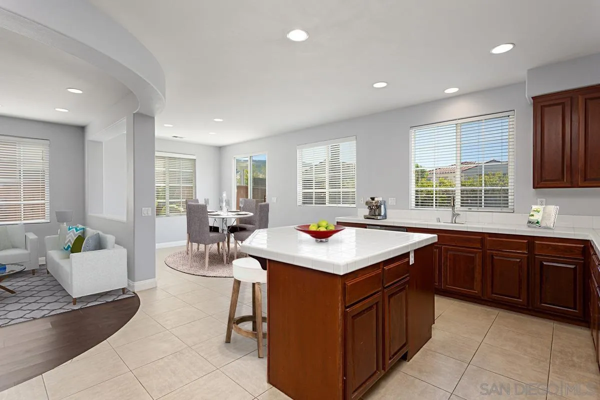 536 Echo Lane San Marcos, CA 92078 - Photo 9 of 24 a kitchen with a sink stove and cabinets