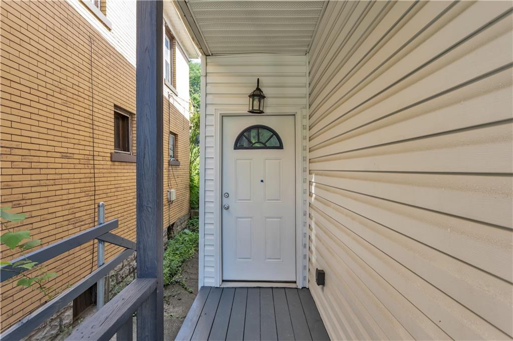 1406 Broadway Avenue McKees Rocks, PA 15136 - Photo 4 of 28 a view of wooden floor in a balcony