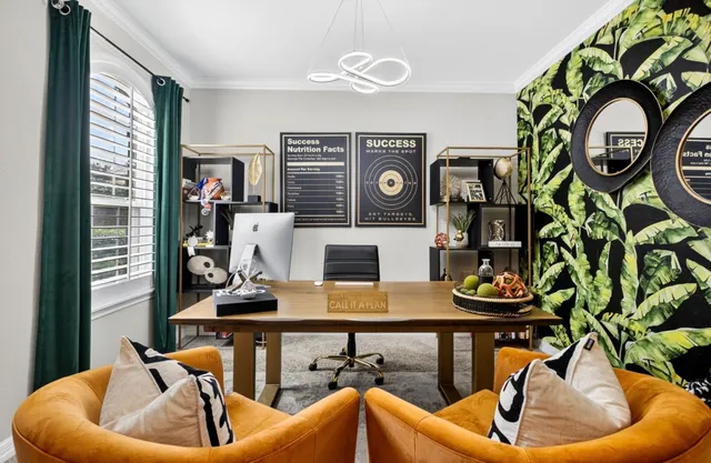 a living room with furniture and a window