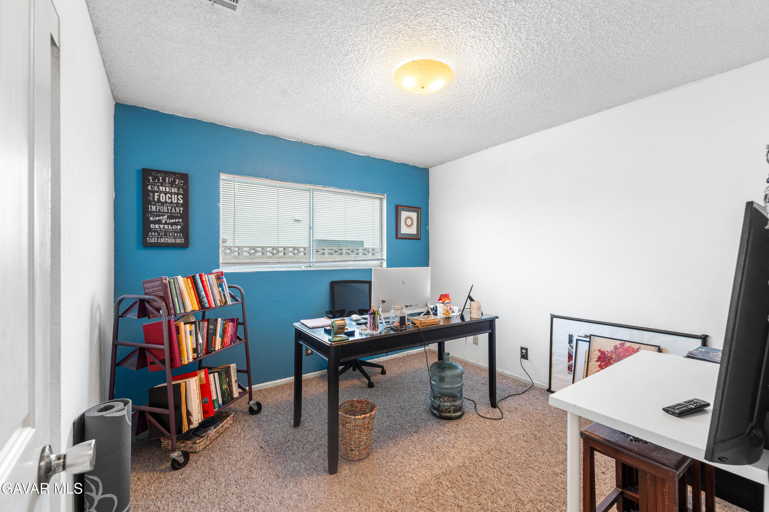 42902 Sachs Drive Lancaster, CA 93536 - Photo 17 of 55 a room with furniture and air hockey table