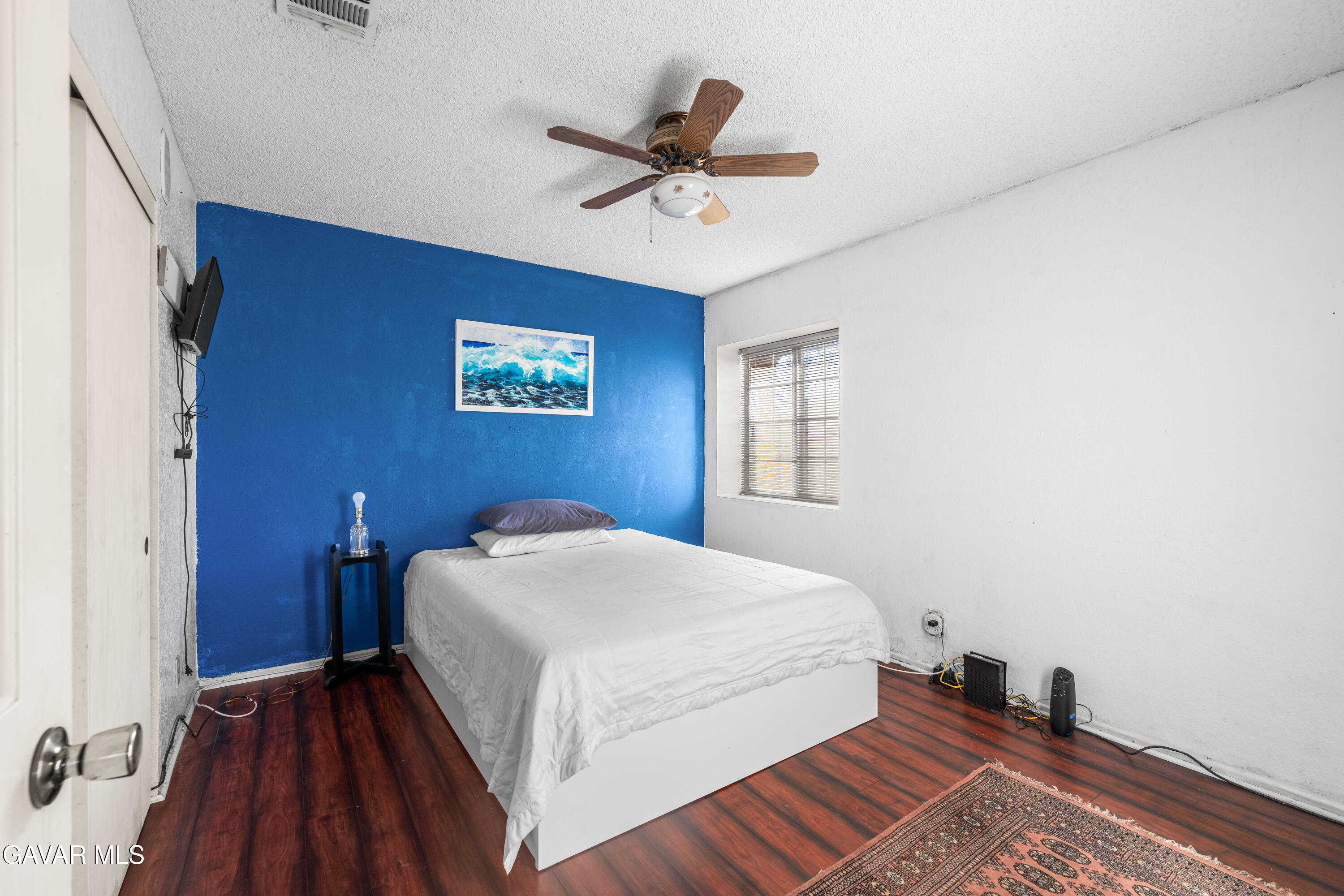 42902 Sachs Drive Lancaster, CA 93536 - Photo 21 of 55 a bedroom with a bed and a window