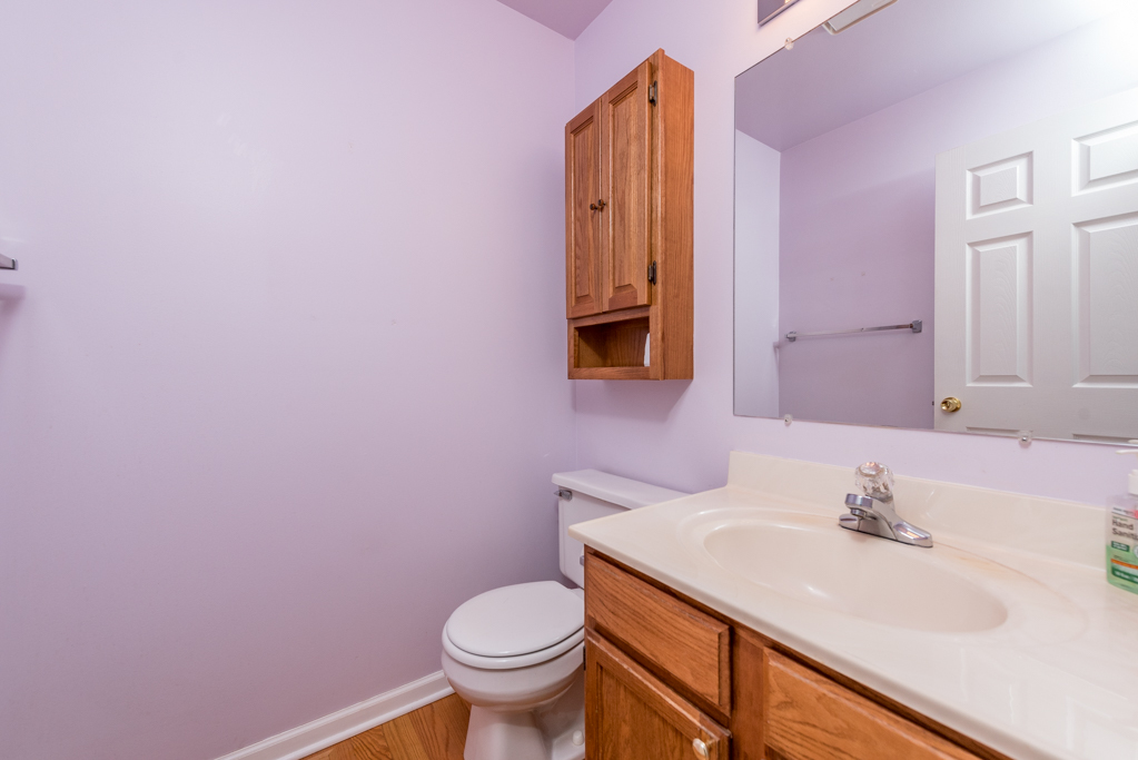 34321 Homestead Road Gurnee, IL 60031 - Photo 18 of 30 a bathroom with a sink and a toilet