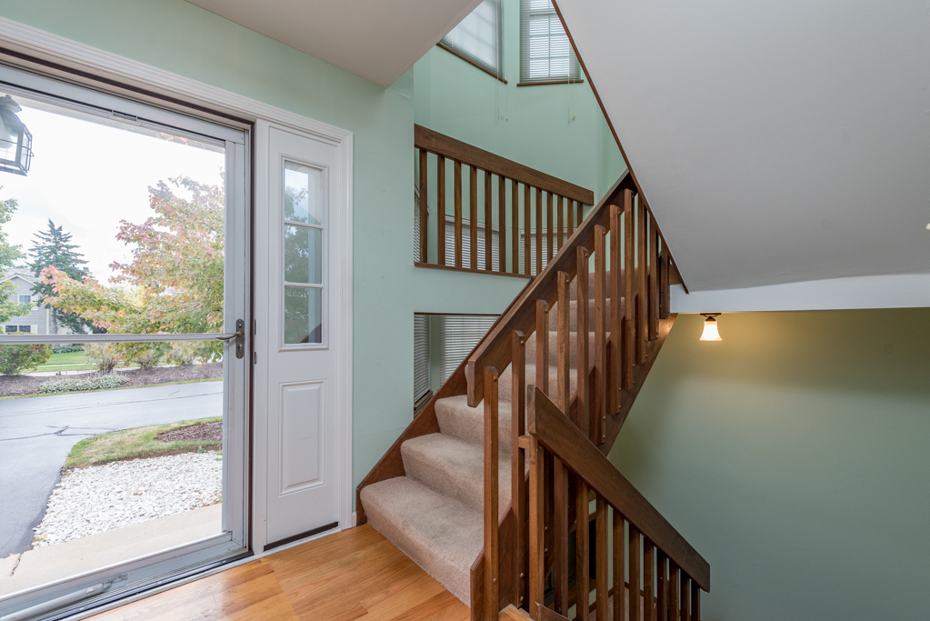 34321 Homestead Road Gurnee, IL 60031 - Photo 19 of 30 a view of entryway and hall with wooden floor