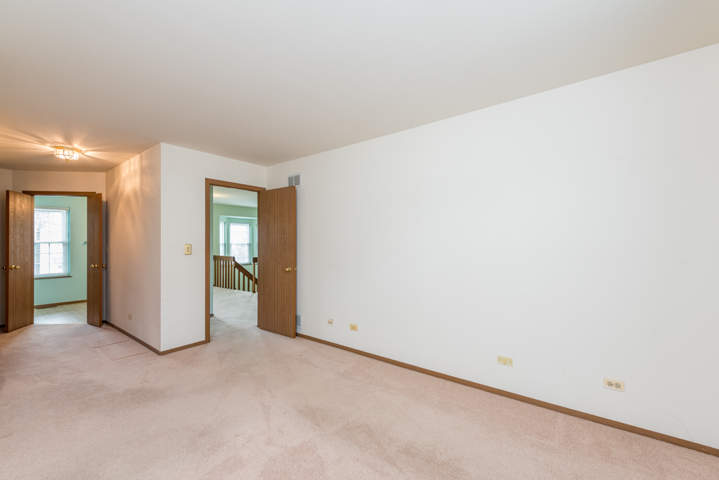 34321 Homestead Road Gurnee, IL 60031 - Photo 22 of 30 an empty room with closet area