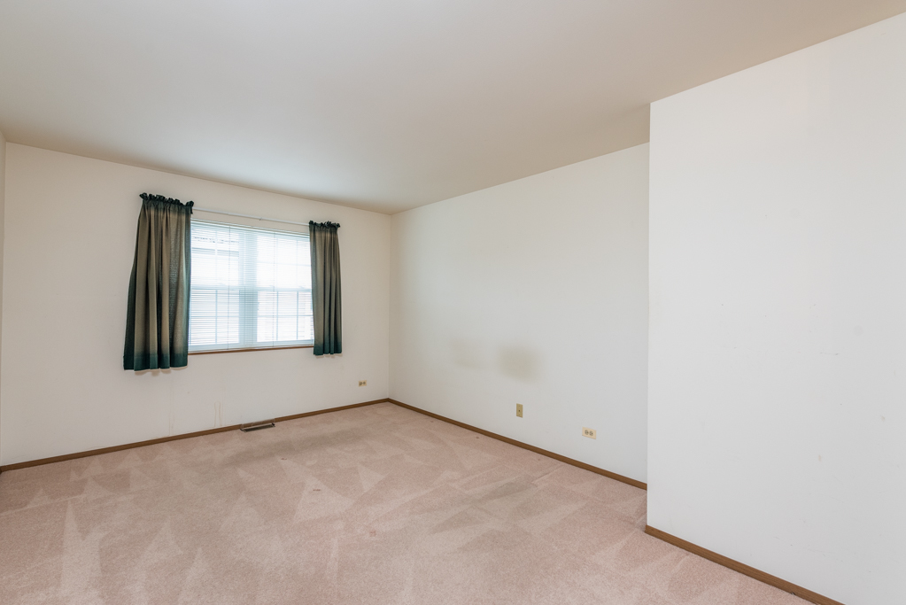34321 Homestead Road Gurnee, IL 60031 - Photo 24 of 30 a view of an empty room with a window