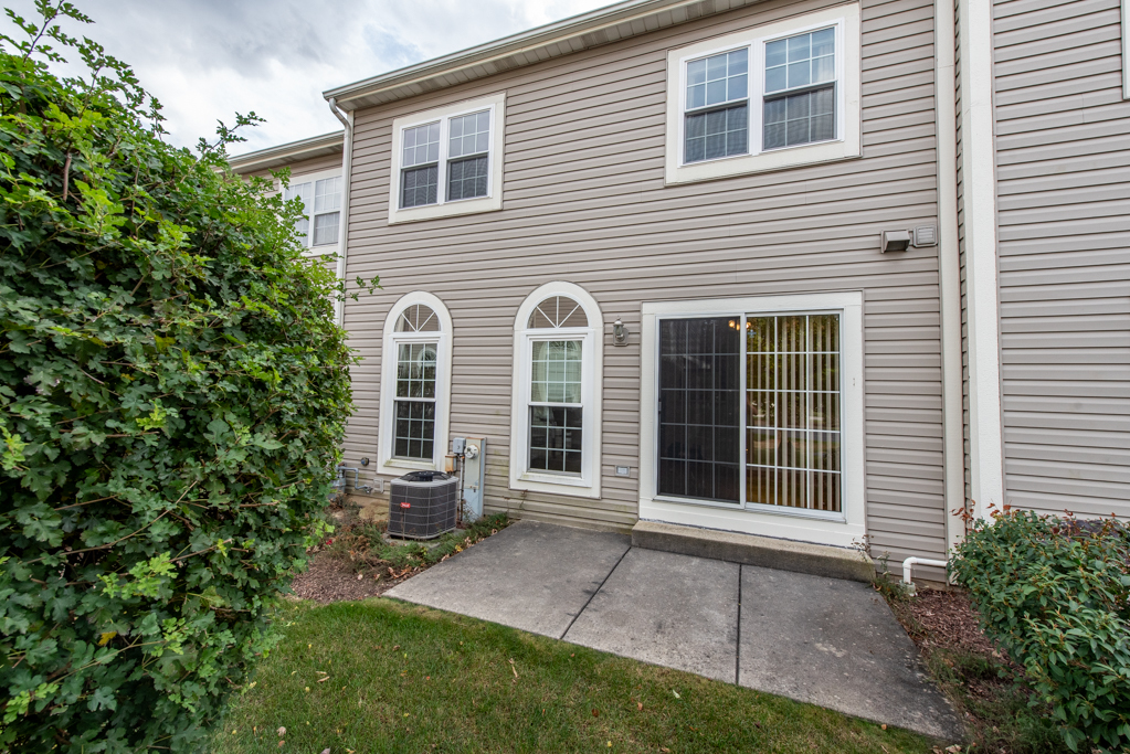 34321 Homestead Road Gurnee, IL 60031 - Photo 5 of 30 a front view of a house with a yard