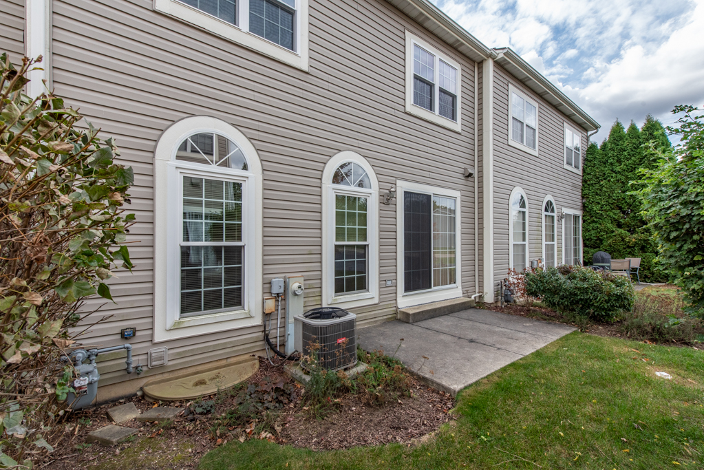 34321 Homestead Road Gurnee, IL 60031 - Photo 6 of 30 a front view of a house with a yard