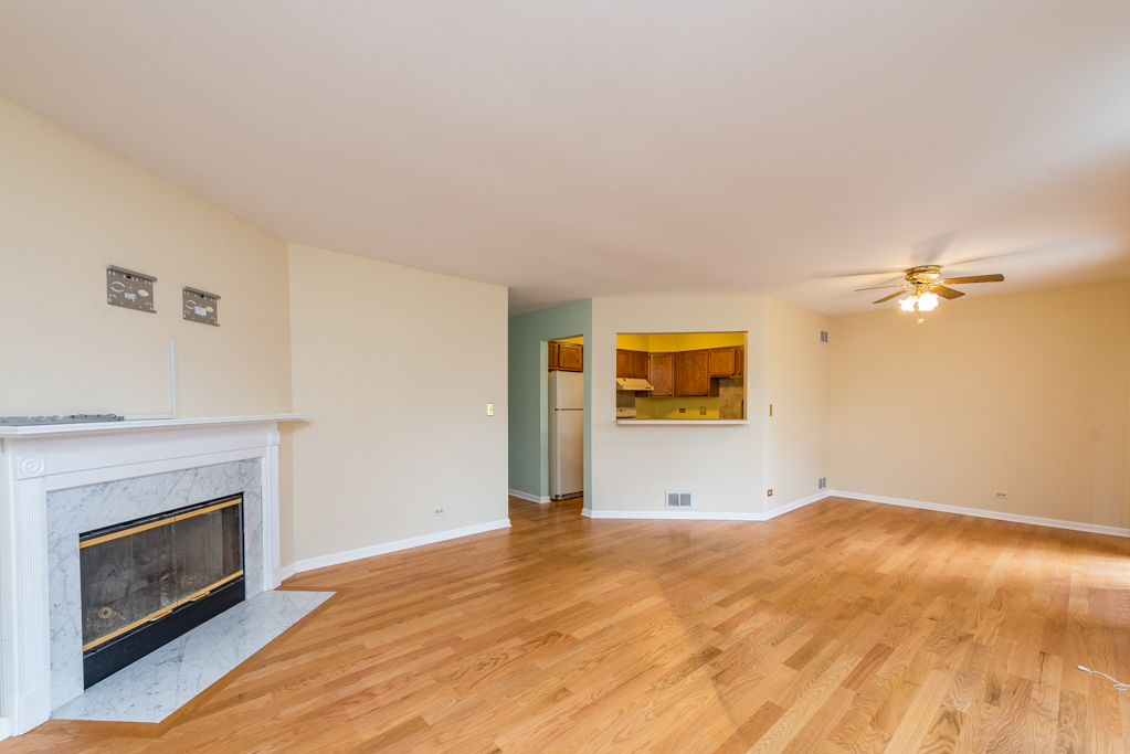 34321 Homestead Road Gurnee, IL 60031 - Photo 9 of 30 a view of empty room with a fireplace