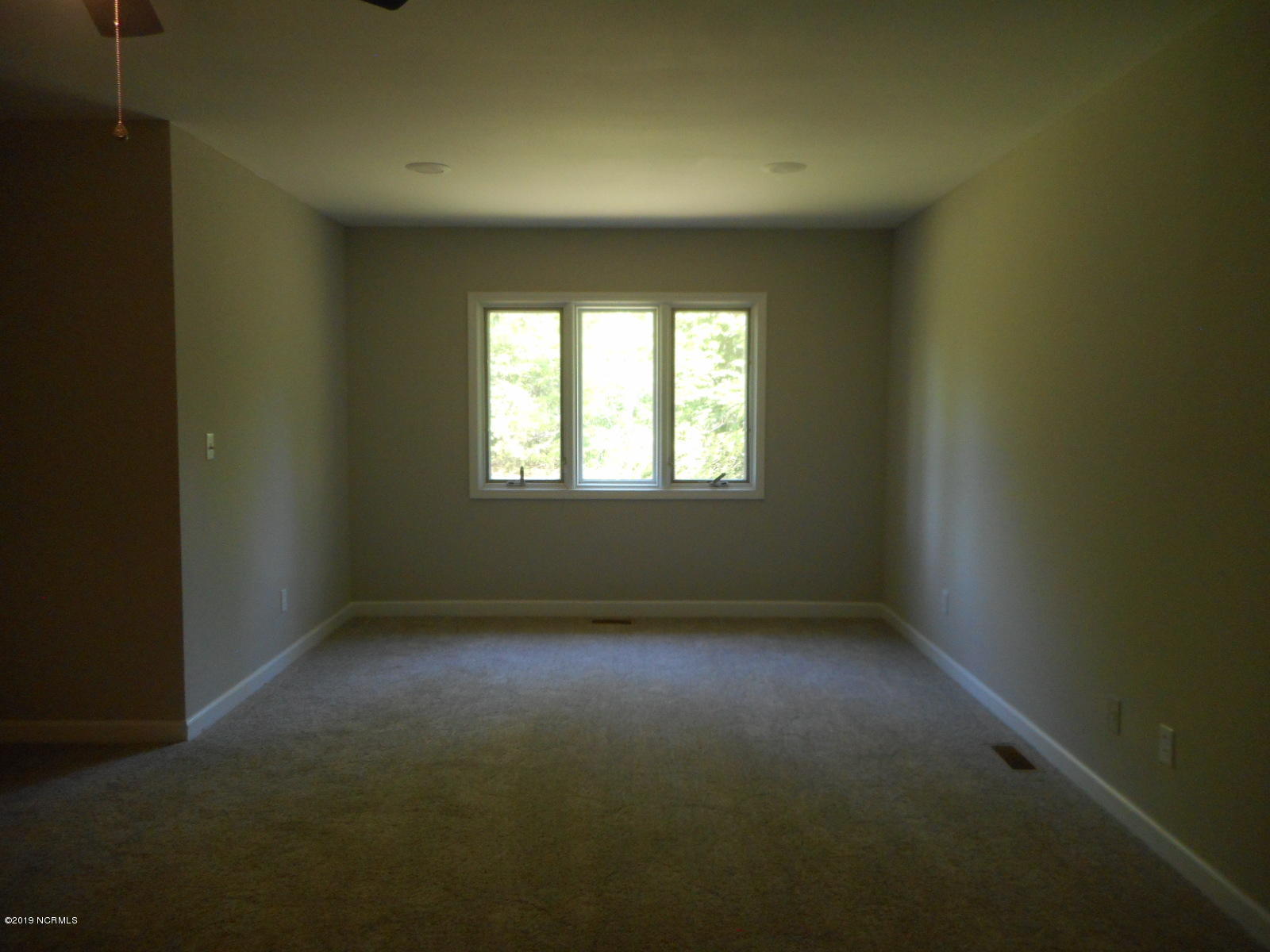 105 Culpeper Road New Bern, NC 28562 - Photo 19 of 53 Bedroom 1 toward sitting