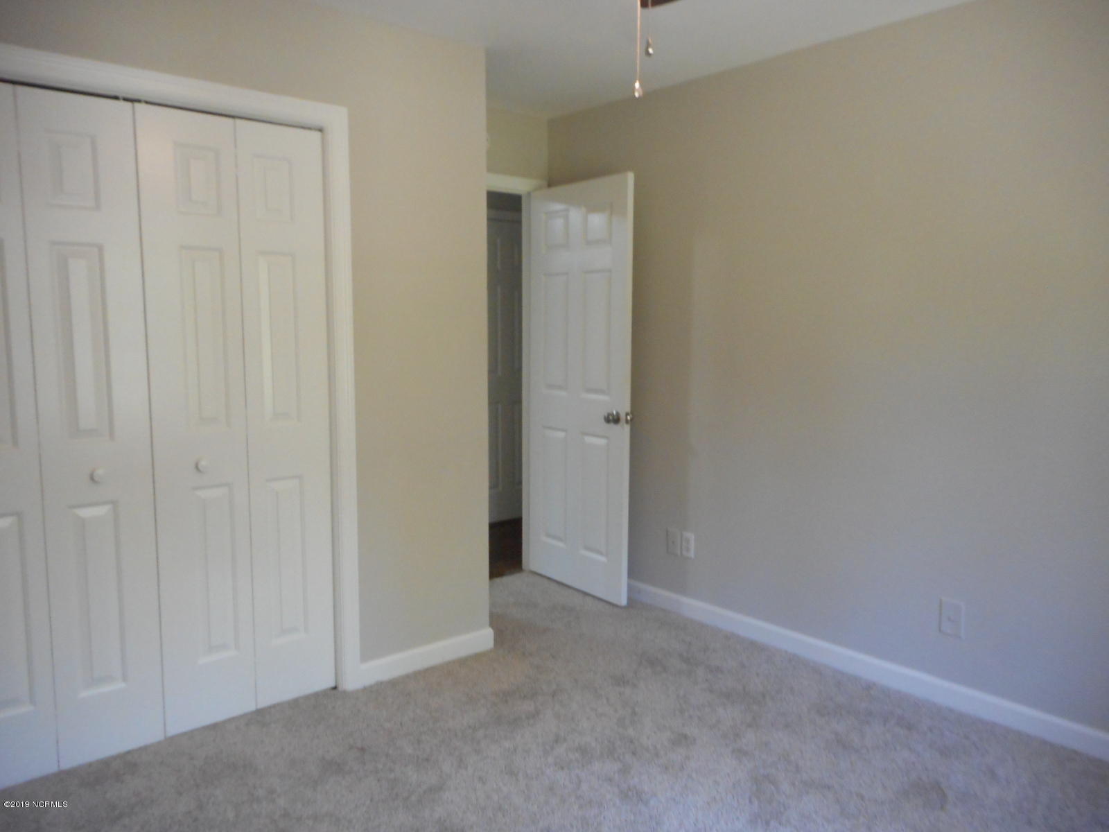105 Culpeper Road New Bern, NC 28562 - Photo 31 of 53 Bedroom 3 toward door 2