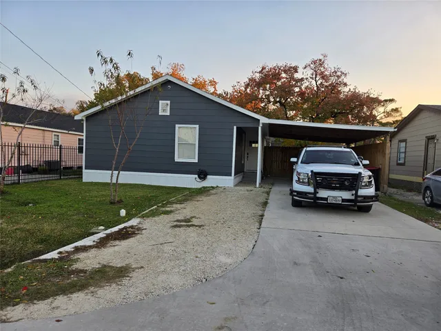 a house view with a garden space