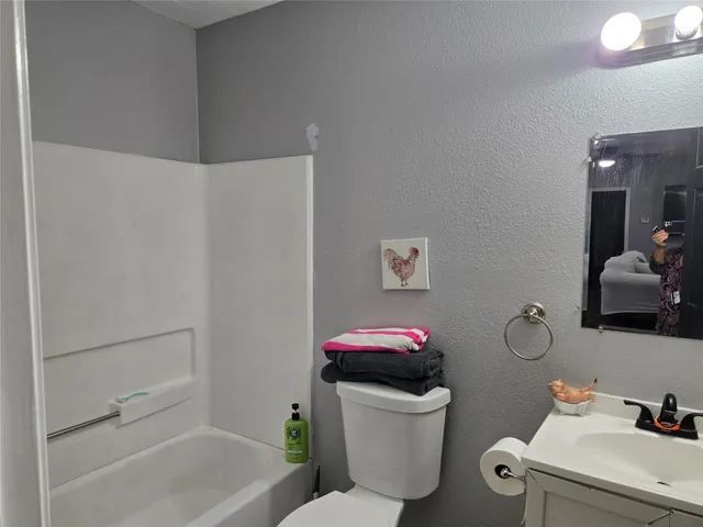 a house view with a backyard space