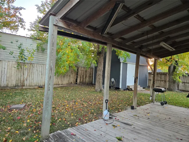 a house view with a garden space
