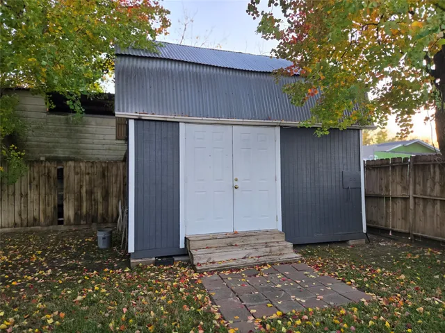 a view of street with parked cars