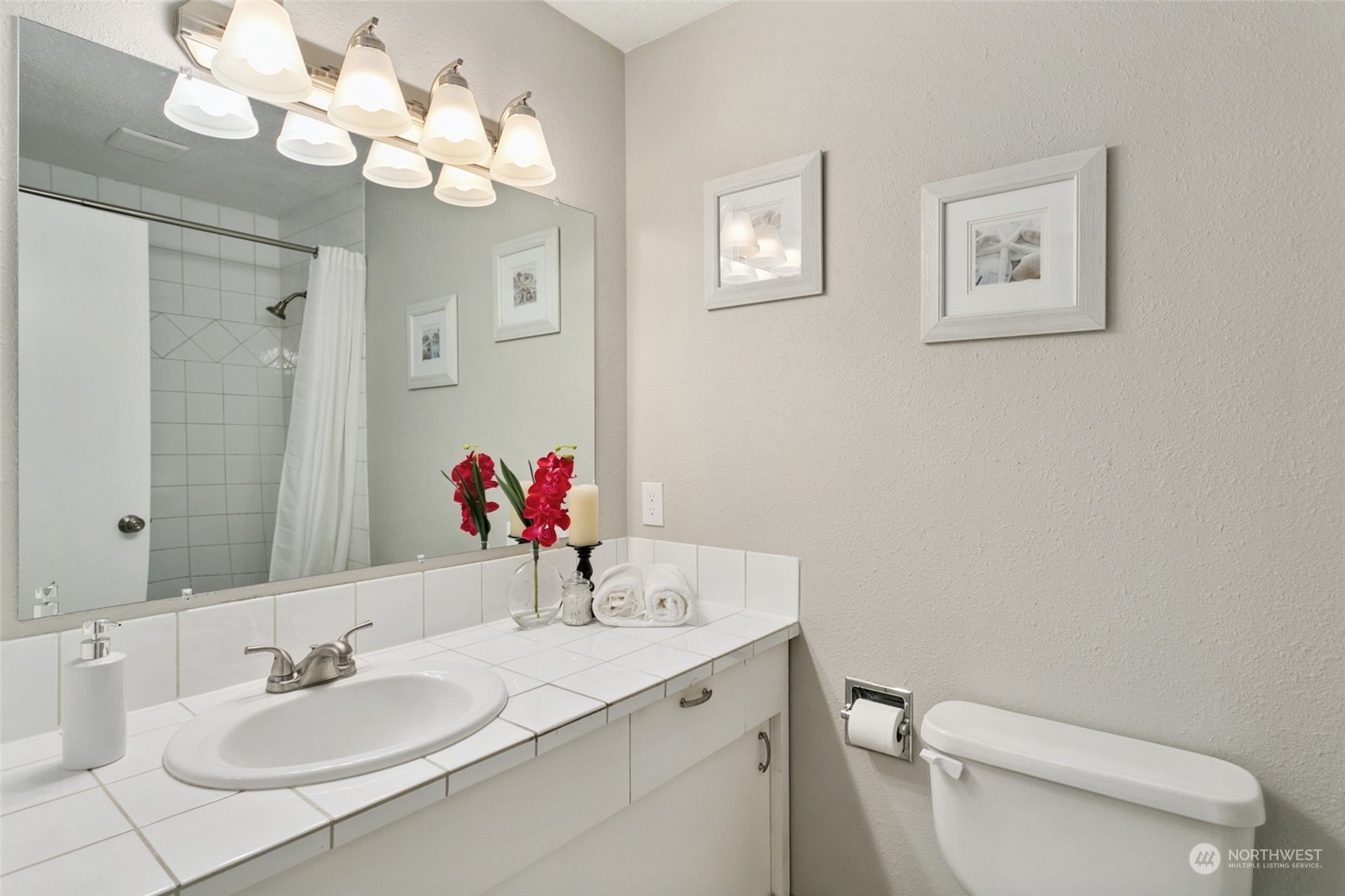 1425 South Puget Drive, Unit H5 Renton, WA 98055 - Photo 20 of 29 a bathroom with a sink vanity granite and toilet