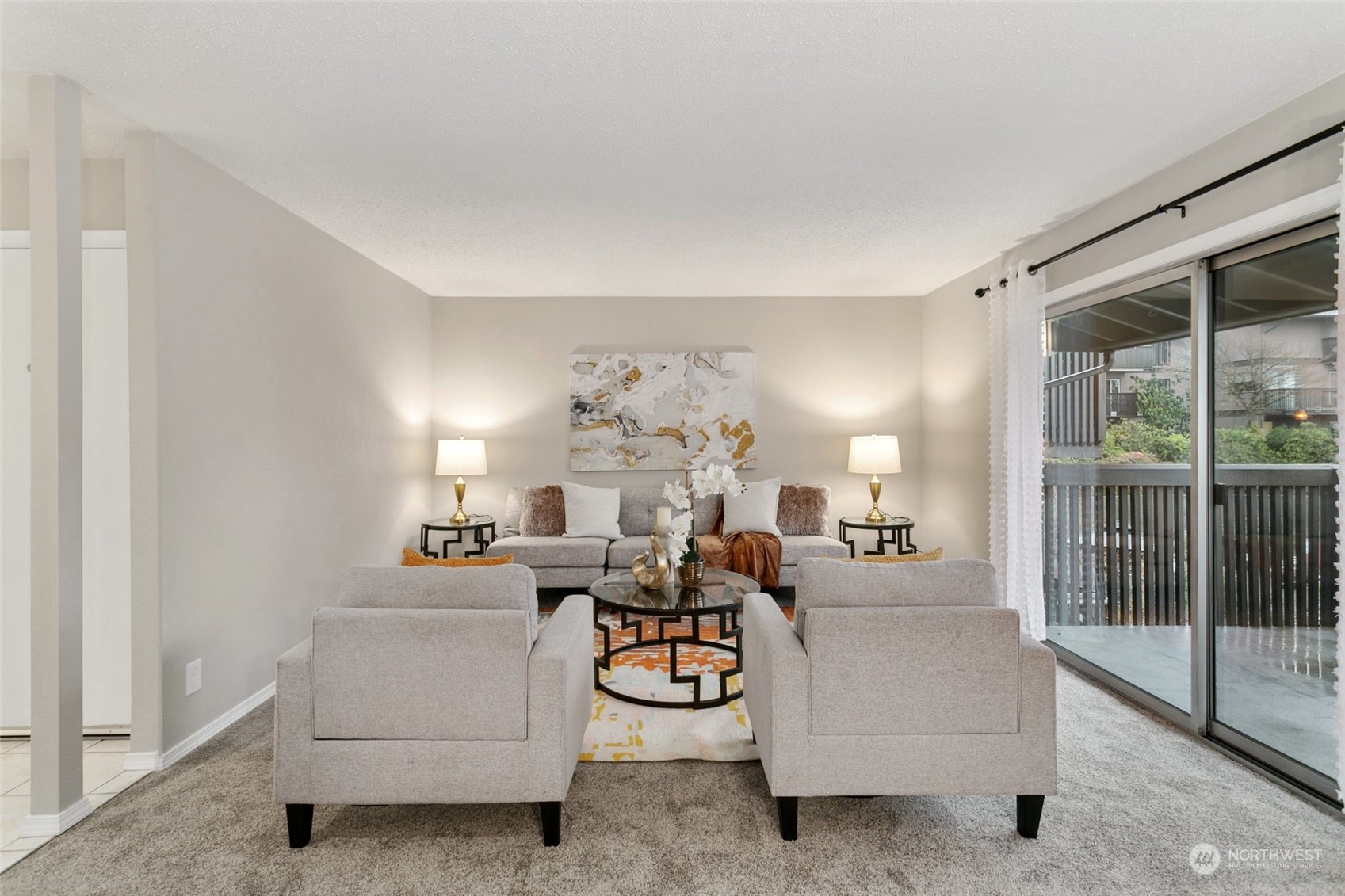 1425 South Puget Drive, Unit H5 Renton, WA 98055 - Photo 2 of 29 a living room with furniture and a large window