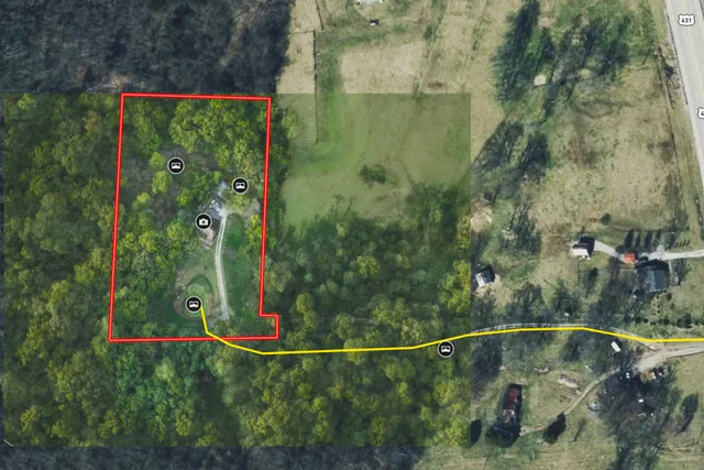 a view of a chairs and table in the balcony