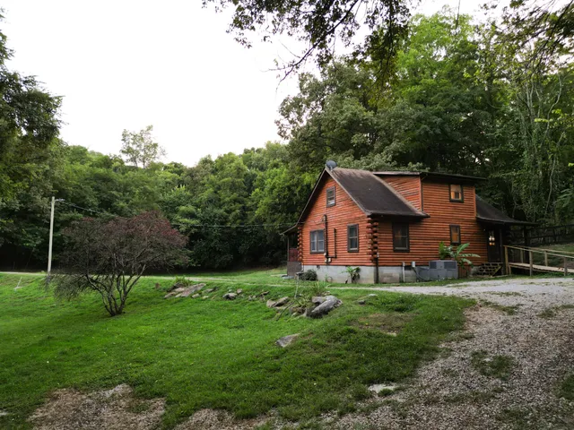 an aerial view of house with outdoor space