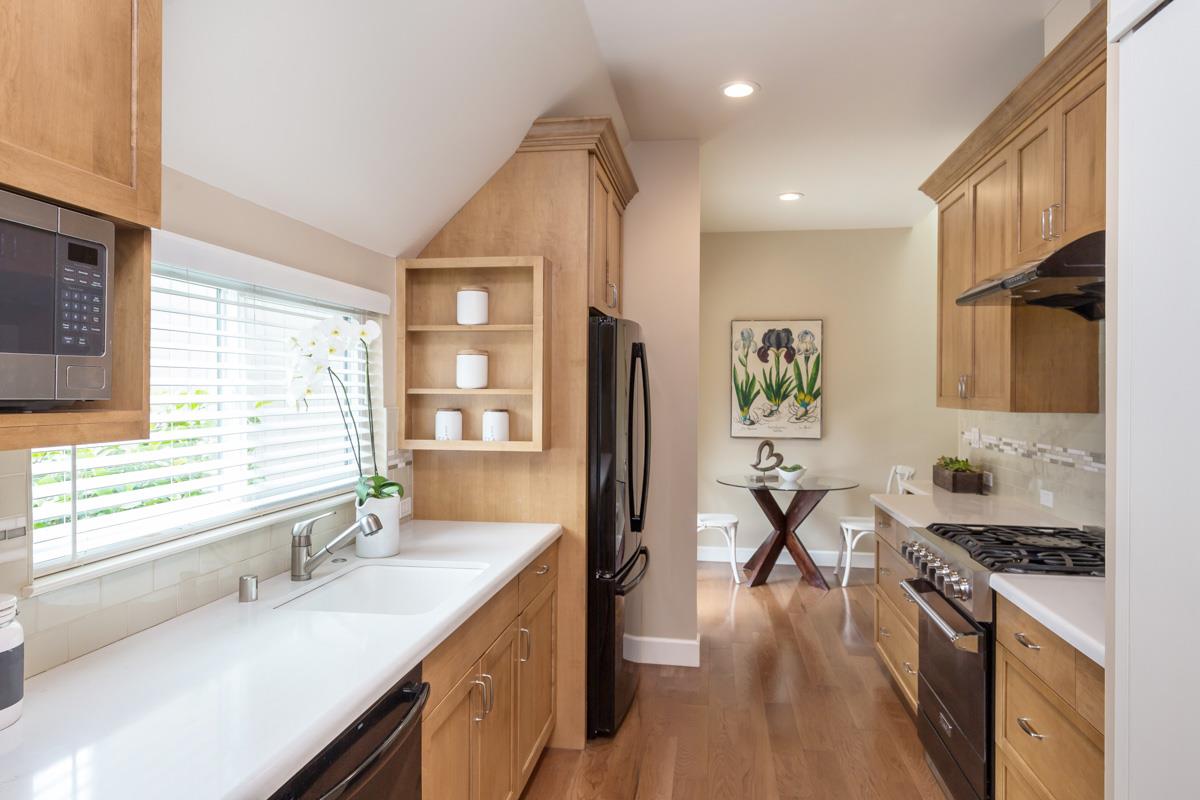 8 Farm Road Los Altos, CA 94024 - Photo 3 of 19 a kitchen with a sink appliances wooden floor and a window