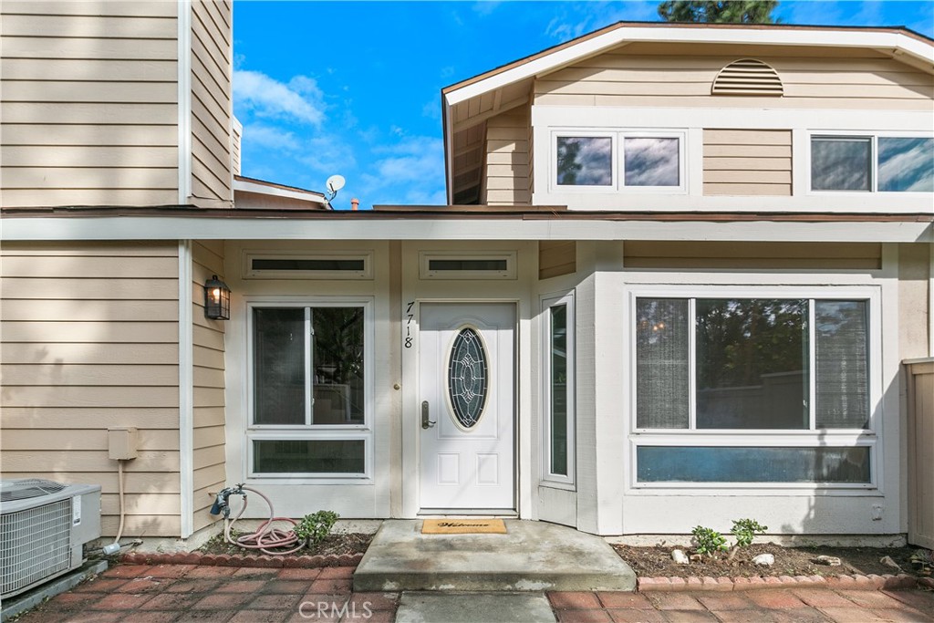 a front view of a house with glass windows