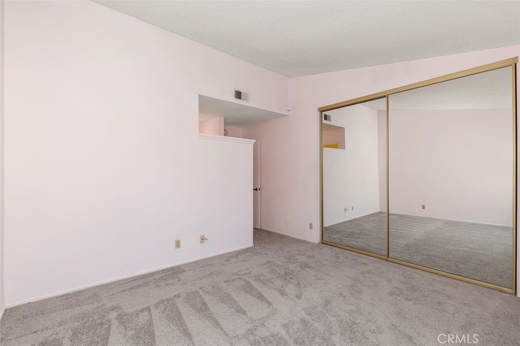 7718 Rambling Brook Way Stanton, CA 90680 - Photo 13 of 23 a view of an empty room