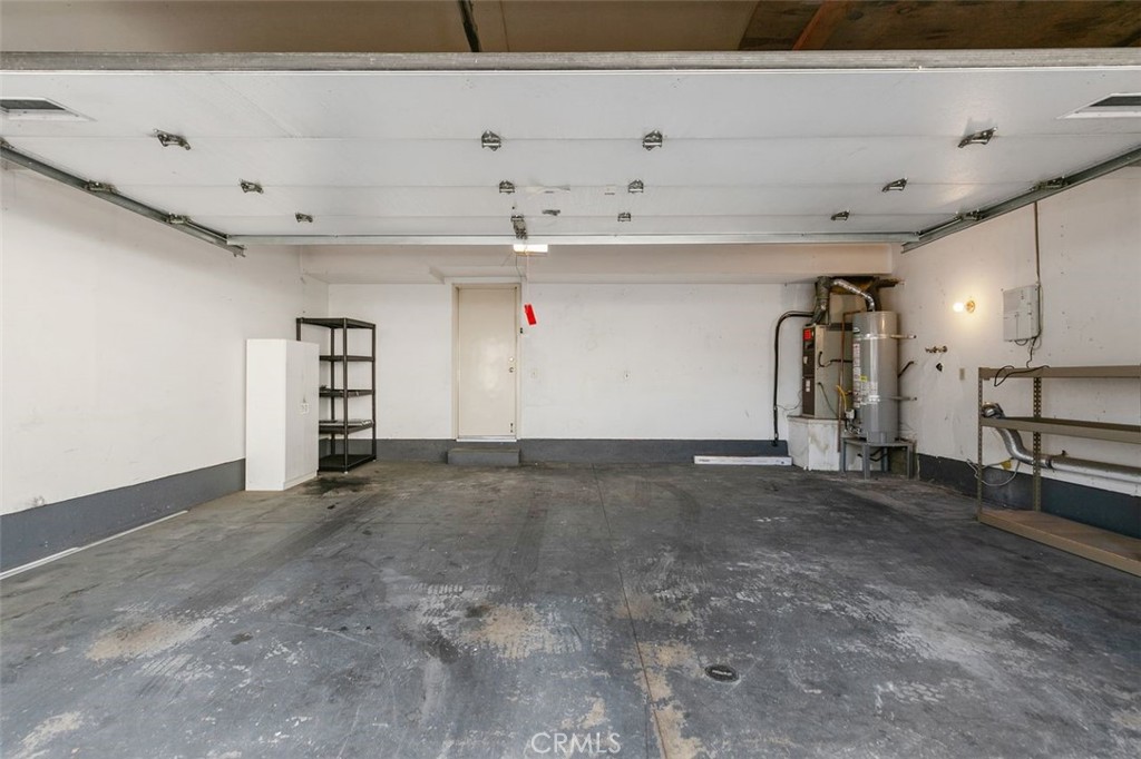7718 Rambling Brook Way Stanton, CA 90680 - Photo 18 of 23 a view of a garage
