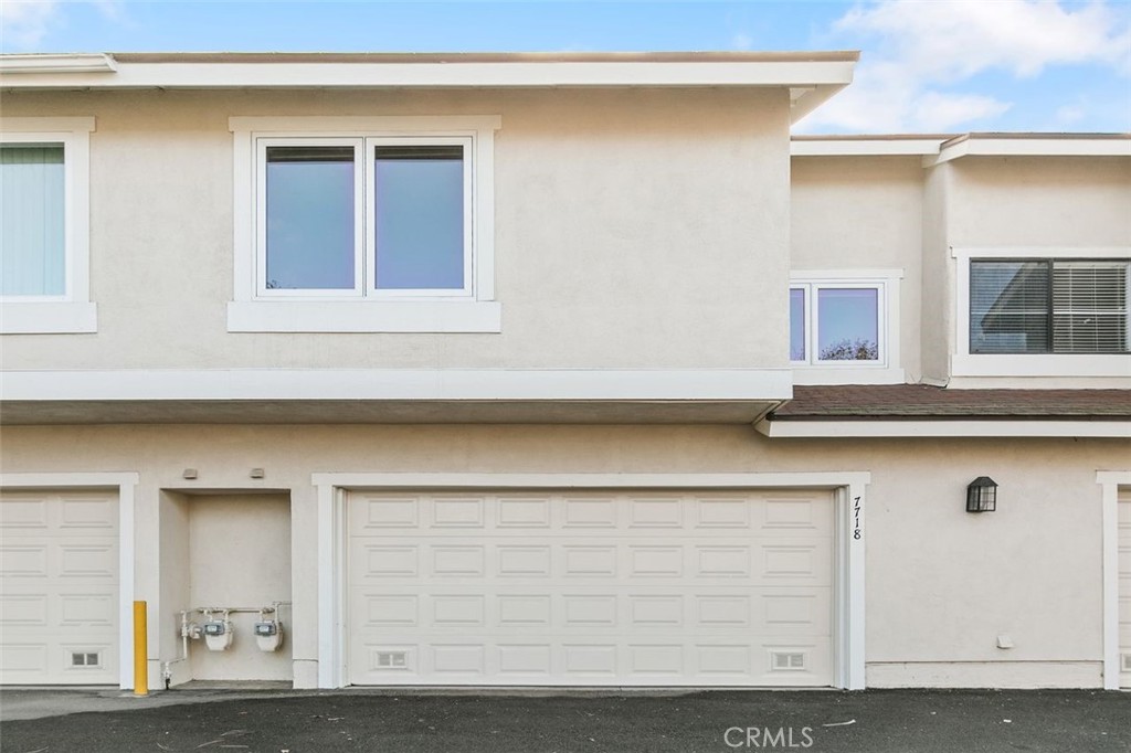 7718 Rambling Brook Way Stanton, CA 90680 - Photo 19 of 23 a front view of a house