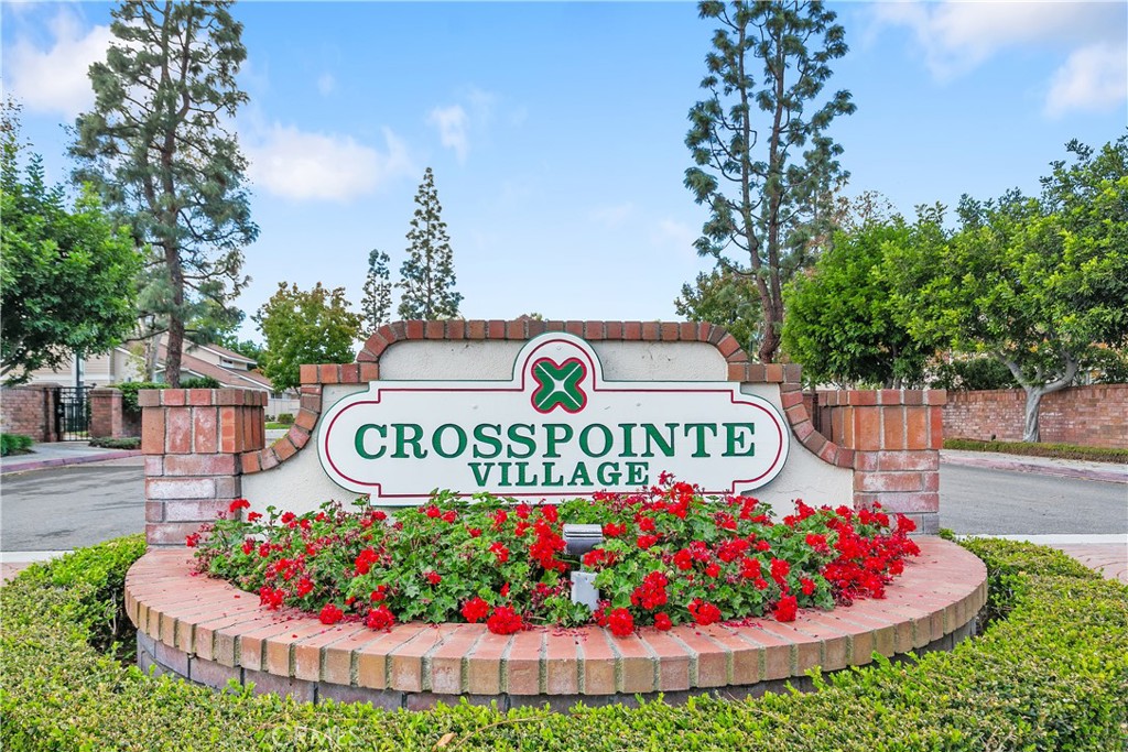 7718 Rambling Brook Way Stanton, CA 90680 - Photo 22 of 23 a sign on the side of the road