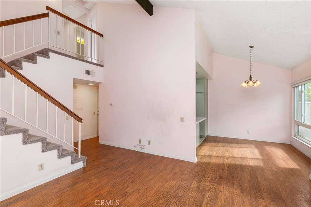 7718 Rambling Brook Way Stanton, CA 90680 - Photo 4 of 23 a view of an entryway with wooden floor