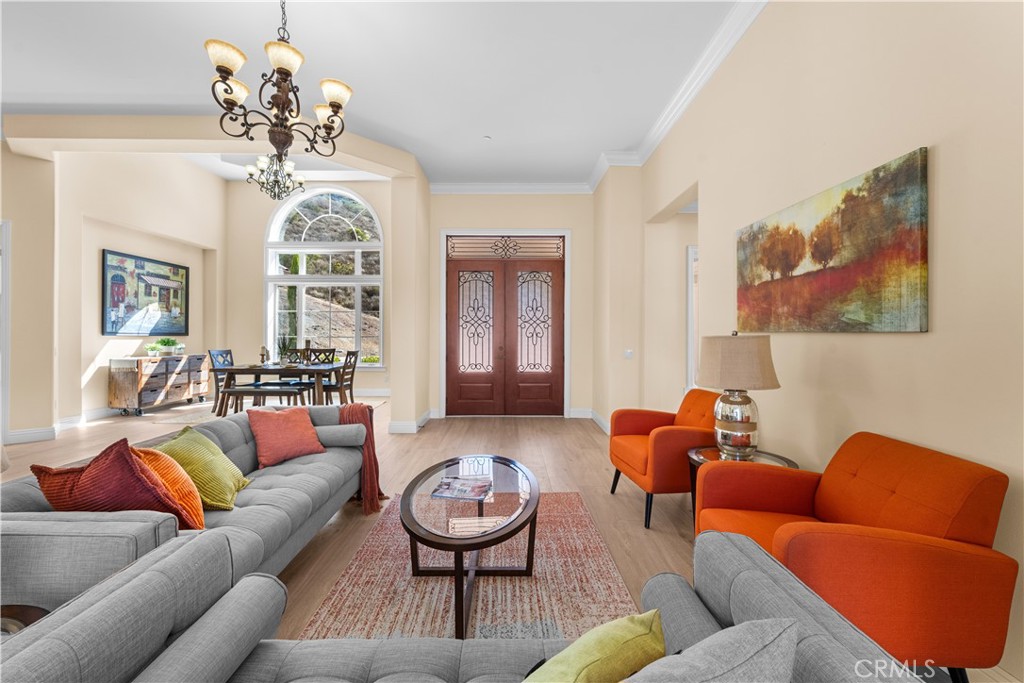 25700 El Chaval Place Temecula, CA 92590 - Photo 14 of 66 a living room with furniture chandelier and a chandelier